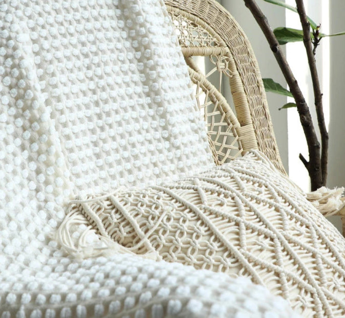 Knitted bohemian fringed blanket