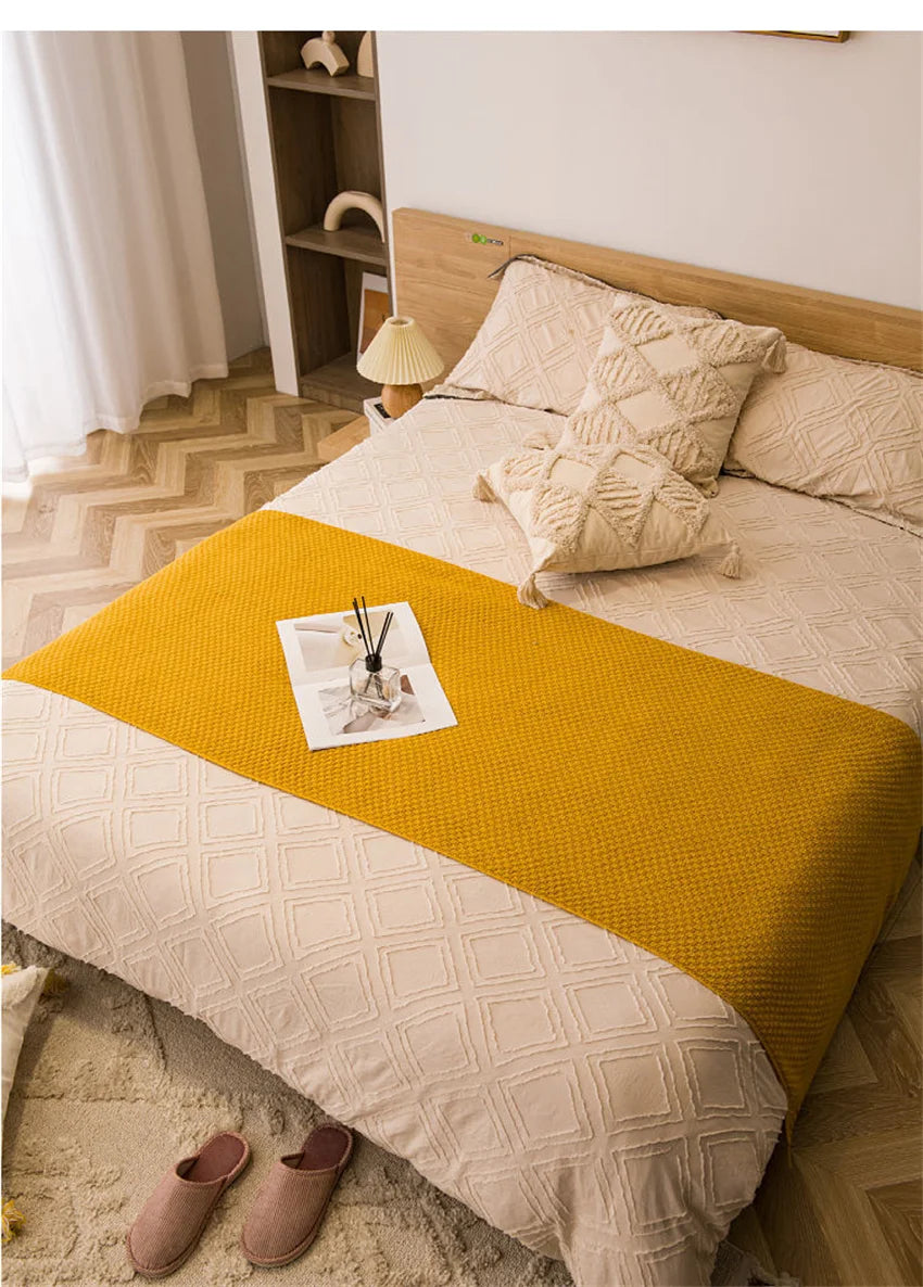 Waffle blanket with pompoms
