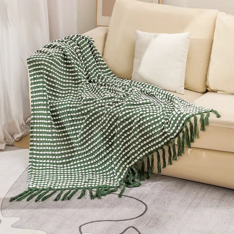 Knitted bohemian fringed blanket