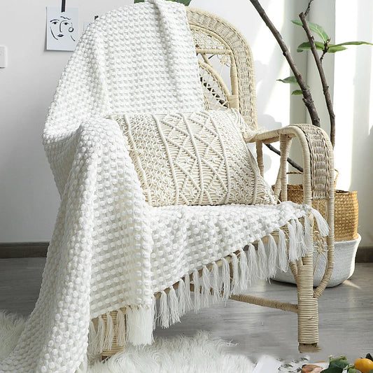Knitted bohemian fringed blanket